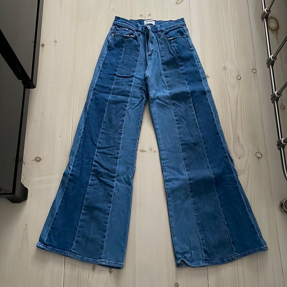 Frame panel fit and flare jeans.